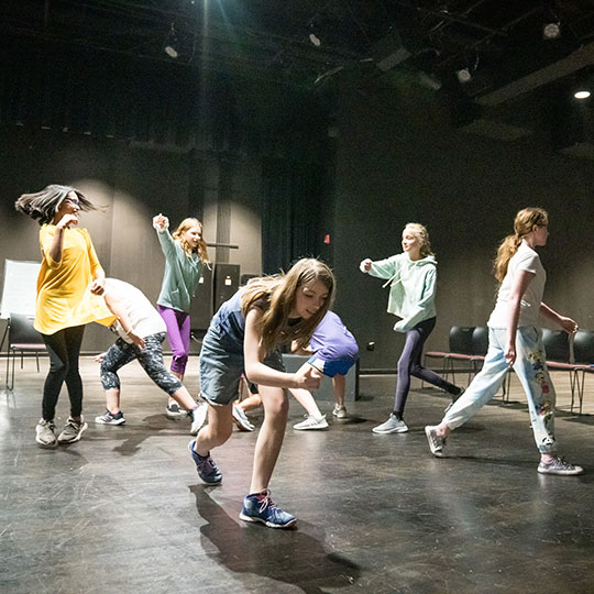 Students participate in an acting class