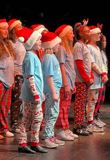 Children perform in Dayton Live Creative Academy's Rike's Holiday Windows Spectacular