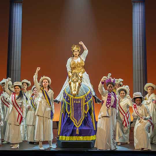 Monica Tulia Ramirez (Inez Milholland) and company in the First National Touring Company of SUFFS. Photo by Joan Marcus, 2025.